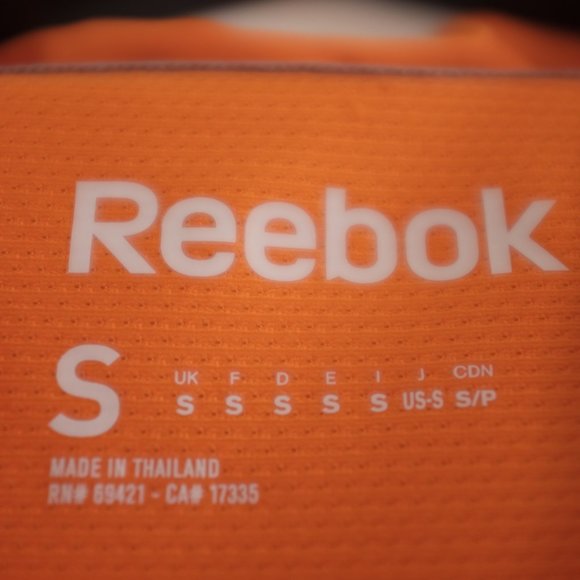 Reebok orange playdry short sleeves polo shirt S - Picture 4 of 7